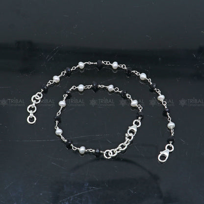 Sterling silver and black beaded chain bracelet from Tribal Ornaments, versatile for bracelets or anklets, suitable for babies or girls.