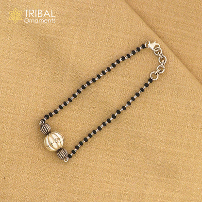 Sterling silver black beaded girls bracelet from TRIBAL ORNAMENTS, modern cultural design, with multiple sizes and a mangalsutra style.