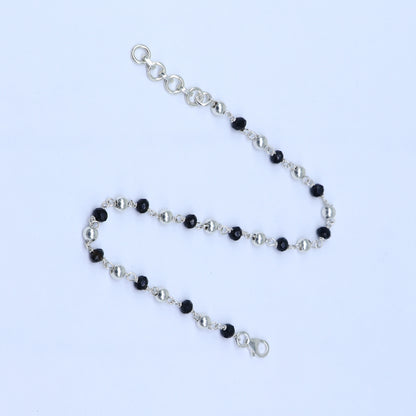 Sterling silver and black beaded chain bracelet by TRIBAL ORNAMENTS, versatile as bracelet or anklet, with pearl accents.