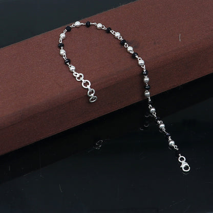 Sterling silver and black beaded chain bracelet by TRIBAL ORNAMENTS, versatile as bracelet or anklet, with pearl accents.