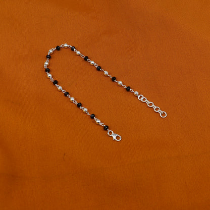 Sterling silver and black beaded chain bracelet by Tribal Ornaments, doubles as bracelet or anklet with pearl accents.