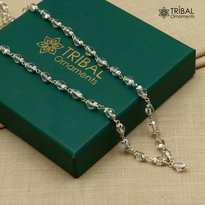 Tribal Ornaments 54/108 beads Sphatik mala Navkar Jaap chant necklace in 925 solid silver, featuring polished transparent Sphatik beads.