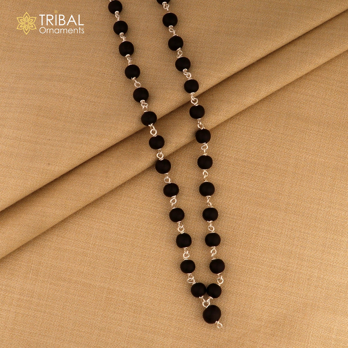 Handmade Karungali round beads mala on a 925 solid silver chain necklace by Tribal Ornaments, featuring 54/108 beads detail.
