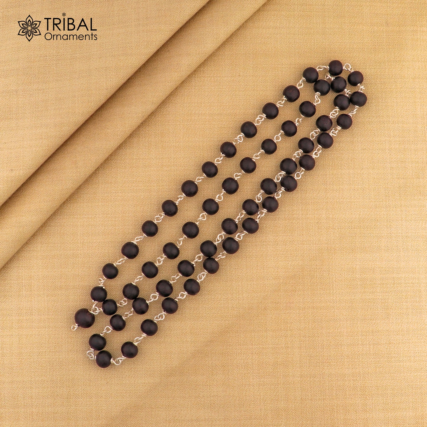 Handmade karungali round beads mala with 54 or 108 beads on a 925 solid silver chain necklace from Tribal Ornaments.