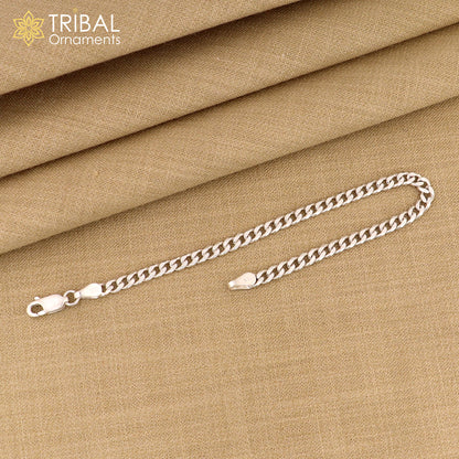 Sterling silver 3mm flat chain bracelet by Tribal Ornaments, flexible unisex jewelry with a sleek, minimalist design.