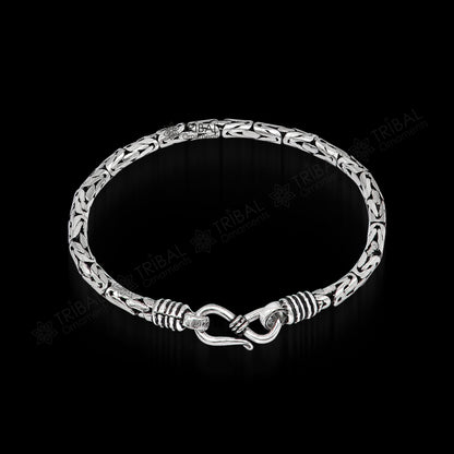 Sterling silver Byzantine chain bracelet featuring flexible unisex design, handmade jewelry with intricate pattern from Tribal Ornaments.