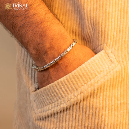 Sterling silver Byzantine design chain bracelet with flexible unisex style, handmade jewelry from India, featuring intricate links.