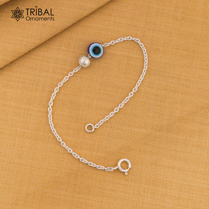 Unisex Evil Eye silver bracelet in 925 Sterling silver with chain design, featuring protective eye charm, tribal-inspired jewelry.
