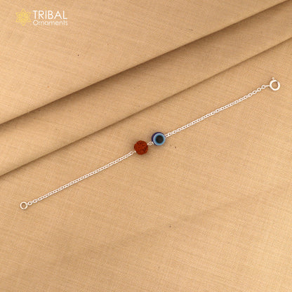 Unisex 925 sterling silver bracelet with evil eye charm and Rudraksha beads, tribal-inspired chain jewelry by TRIBAL ORNAMENTS.
