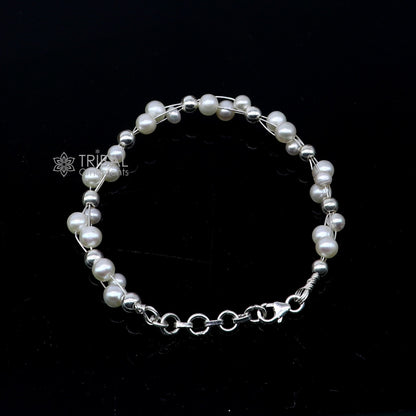 Sterling silver beaded bracelet with natural pearl accents, unisex jewelry by TRIBAL ORNAMENTS, perfect for gifting.