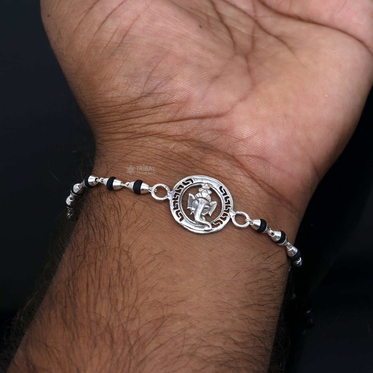925 sterling silver Lord Ganesha design holy basil rosary beads bracelet with black Tulsi beads, handcrafted by Tribal Ornaments.