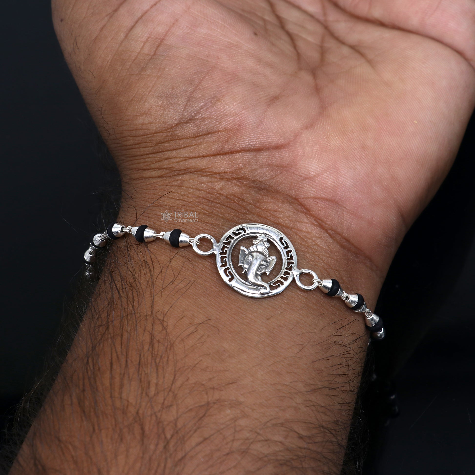 925 sterling silver Lord Ganesha design holy basil rosary beads bracelet with black Tulsi beads, handcrafted by Tribal Ornaments.