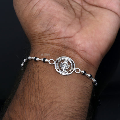 925 sterling silver Lord Ganesha design holy basil rosary beads bracelet with black Tulsi beads, handcrafted by Tribal Ornaments.