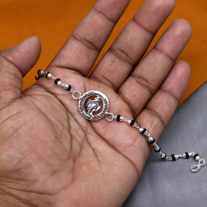 Handmade 925 sterling silver Lord Ganesha design holy basil rosary beads bracelet with black Tulsi beads by TRIBAL ORNAMENTS.