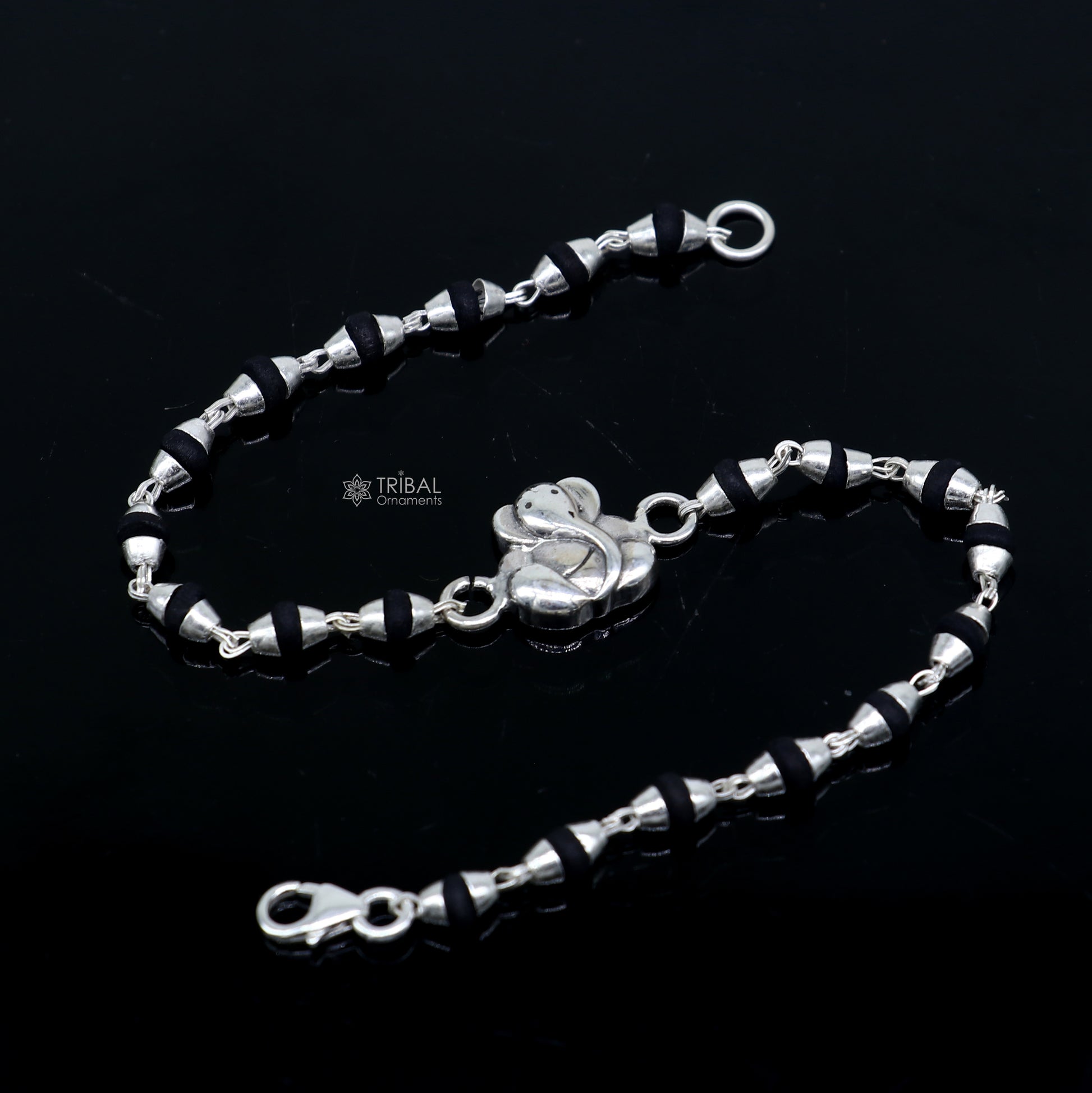 925 sterling silver Lord Ganesha beaded bracelet with black Tulsi beads, handmade tribal ornament design for spiritual wristwear.