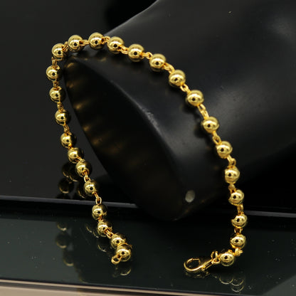 Sterling silver handmade beaded bracelet with gold polish, stylish unisex jewelry, perfect for customized gifting by TRIBAL ORNAMENTS.