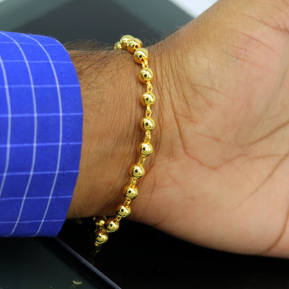 Sterling silver handmade beaded bracelet with polished gold finish, stylish unisex jewelry, perfect for custom gifting by TRIBAL ORNAMENTS.