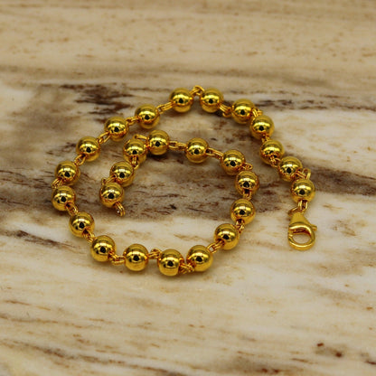 925 Sterling silver beaded bracelet with gold polish, handmade unisex jewelry by TRIBAL ORNAMENTS, stylish and customizable gift accessory.