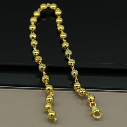 Sterling silver handmade beaded bracelet with gold polish, stylish unisex jewelry, perfect for gifting, by TRIBAL ORNAMENTS.