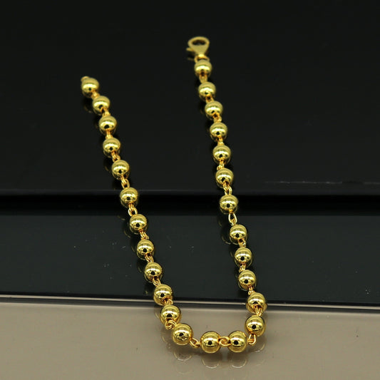 925 Sterling silver handmade beaded bracelet with polished gold finish, stylish unisex jewelry perfect for gifting by TRIBAL ORNAMENTS.