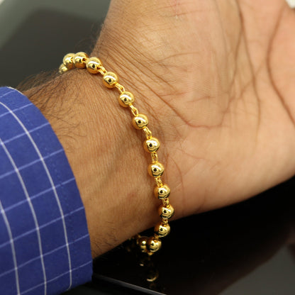 Sterling silver handmade beaded bracelet with gold polish, stylish unisex jewelry, perfect for customized gifting by TRIBAL ORNAMENTS.