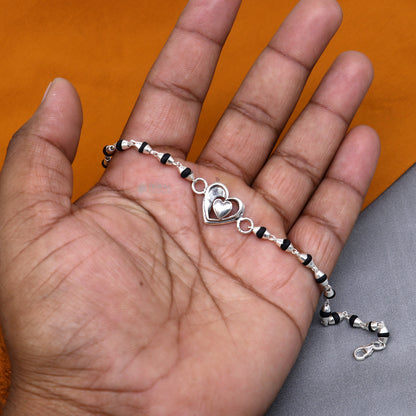 925 Sterling Silver Heart Design Black Tulsi Beads Bracelet with handmade tribal style for rakhi celebration.
