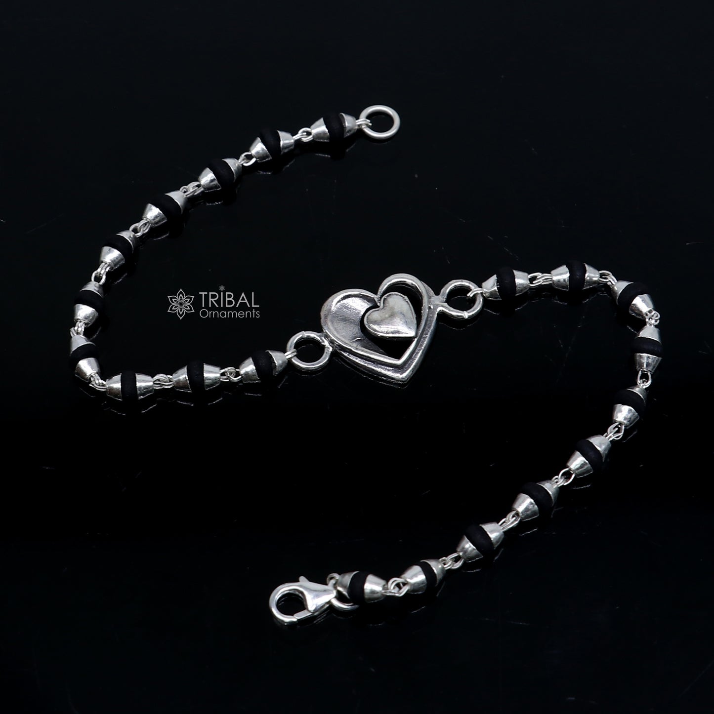 925 Sterling Silver Heart Design Tulsi Beads Bracelet with black beads, handmade tribal ornament for rakhi celebration.