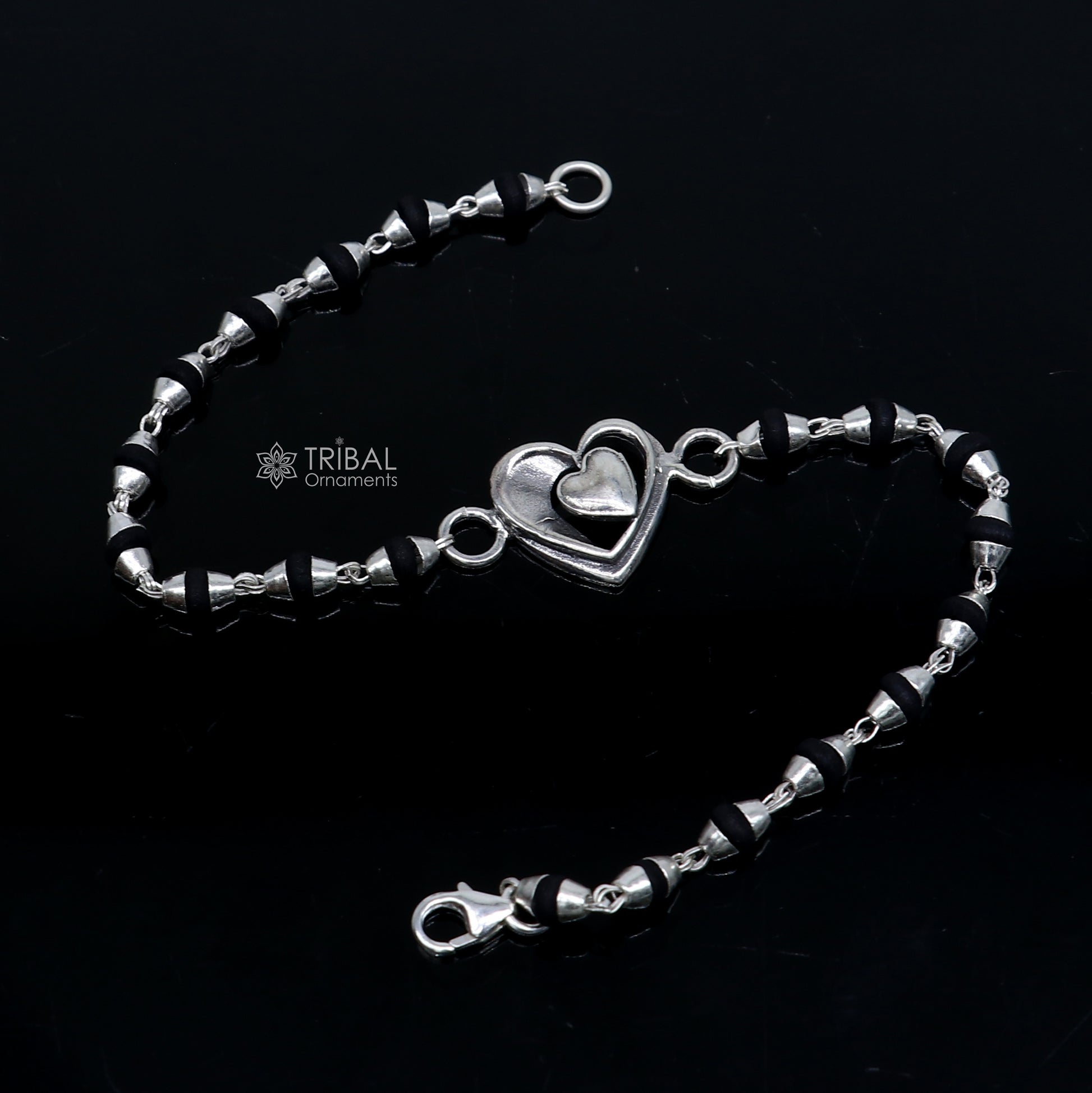 925 Sterling Silver Heart Design Tulsi Beads Bracelet with black beads, handmade tribal ornament for rakhi celebration.