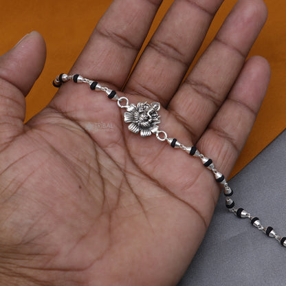 Sterling silver Lord Ganesha bracelet with black Tulsi beads and basil rosary beads, handmade tribal ornament jewelry.
