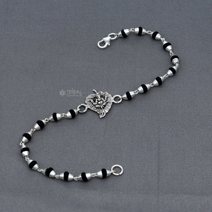 Sterling silver Lord Ganesha bracelet with black Tulsi beads and basil rosary beads, handmade tribal jewelry.