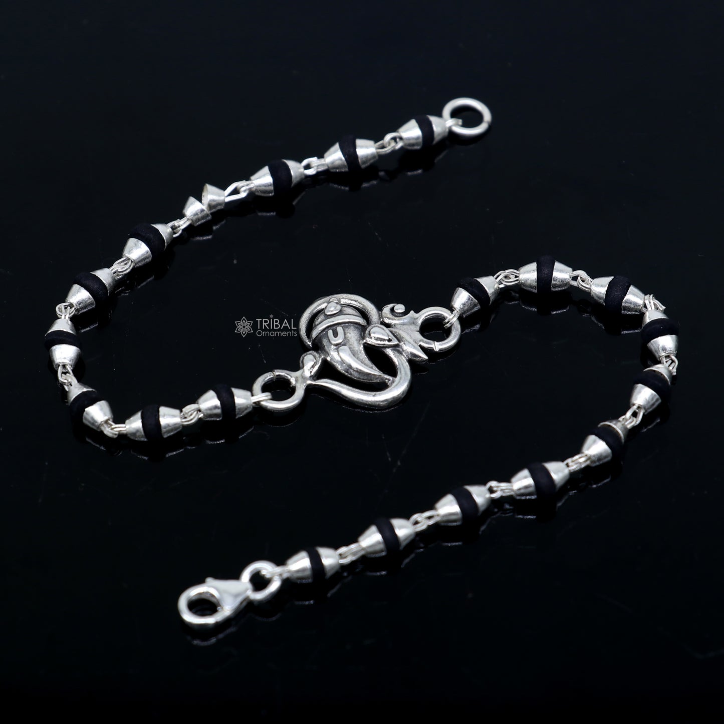 925 sterling silver Lord Ganesha bracelet with black Tulsi beads, handmade tribal ornament with rosary-style design.