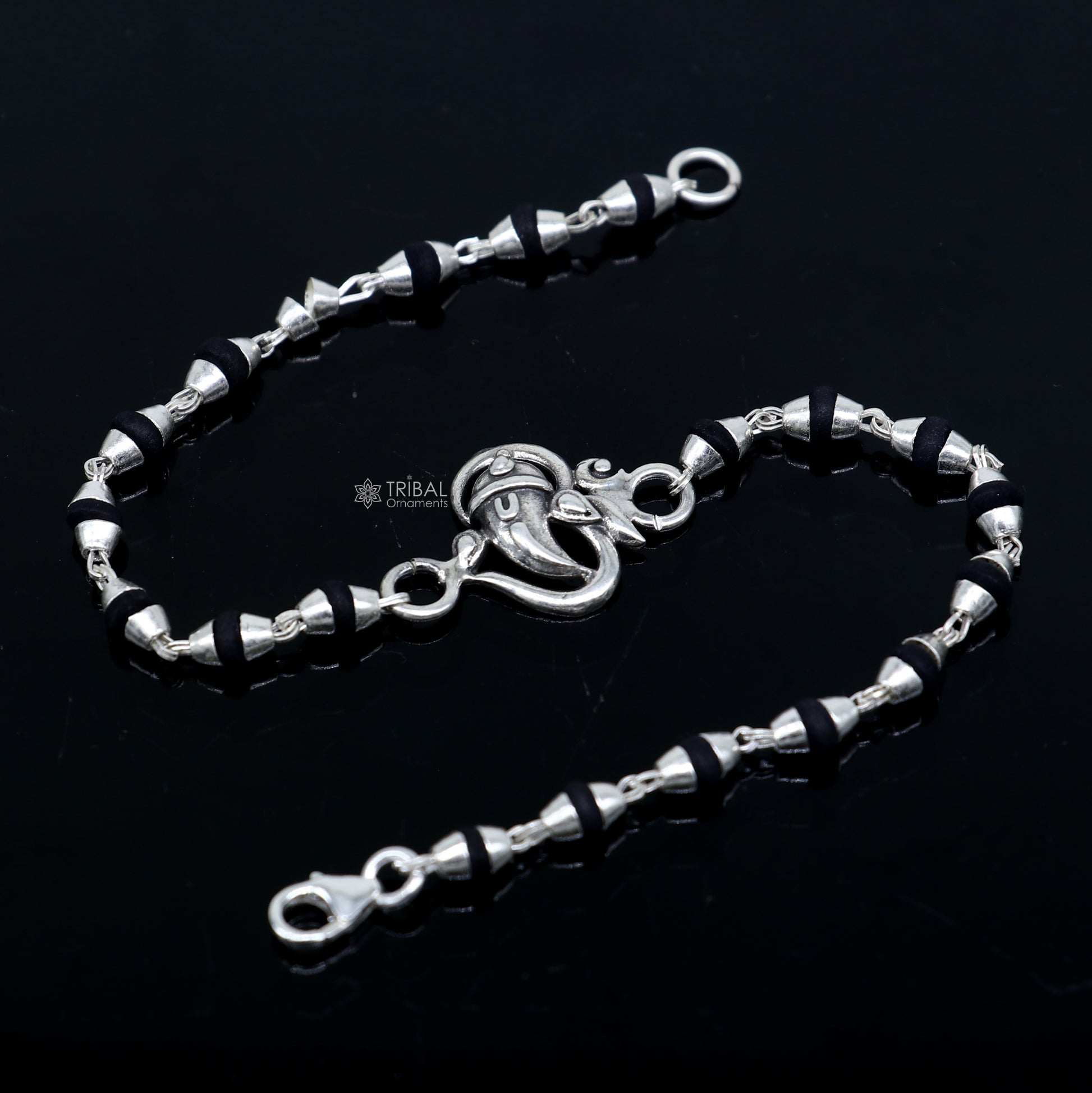 925 sterling silver Lord Ganesha bracelet with black Tulsi beads, handmade tribal ornament with rosary-style design.