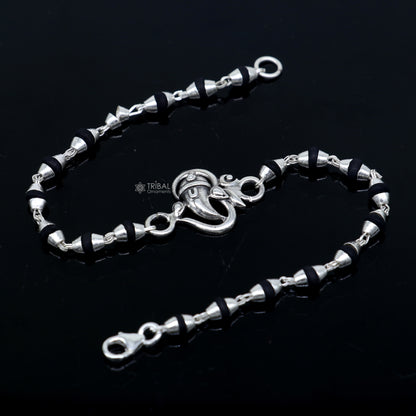 925 sterling silver Lord Ganesha bracelet with black Tulsi beads, handmade tribal ornament with rosary-style design.
