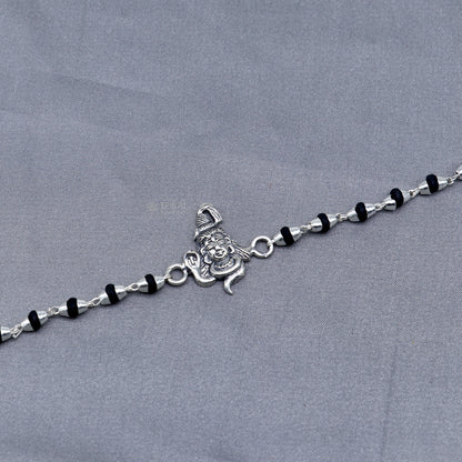 925 silver Lord Shiva black Tulsi beaded bracelet from TRIBAL ORNAMENTS featuring handmade silver beads and holy basil accents.