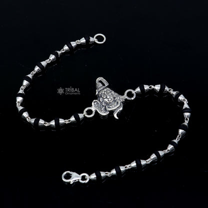 925 silver Lord Shiva black Tulsi beaded bracelet with handmade design and holy basil beads, ideal for traditional Rakhi gifting.
