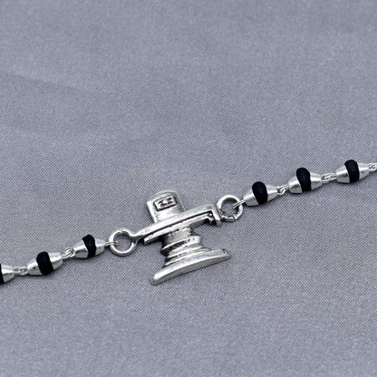 Sterling silver Lord Shiva Lingam bracelet with black Tulsi beads and basil rosary beads, handmade by Tribal Ornaments.