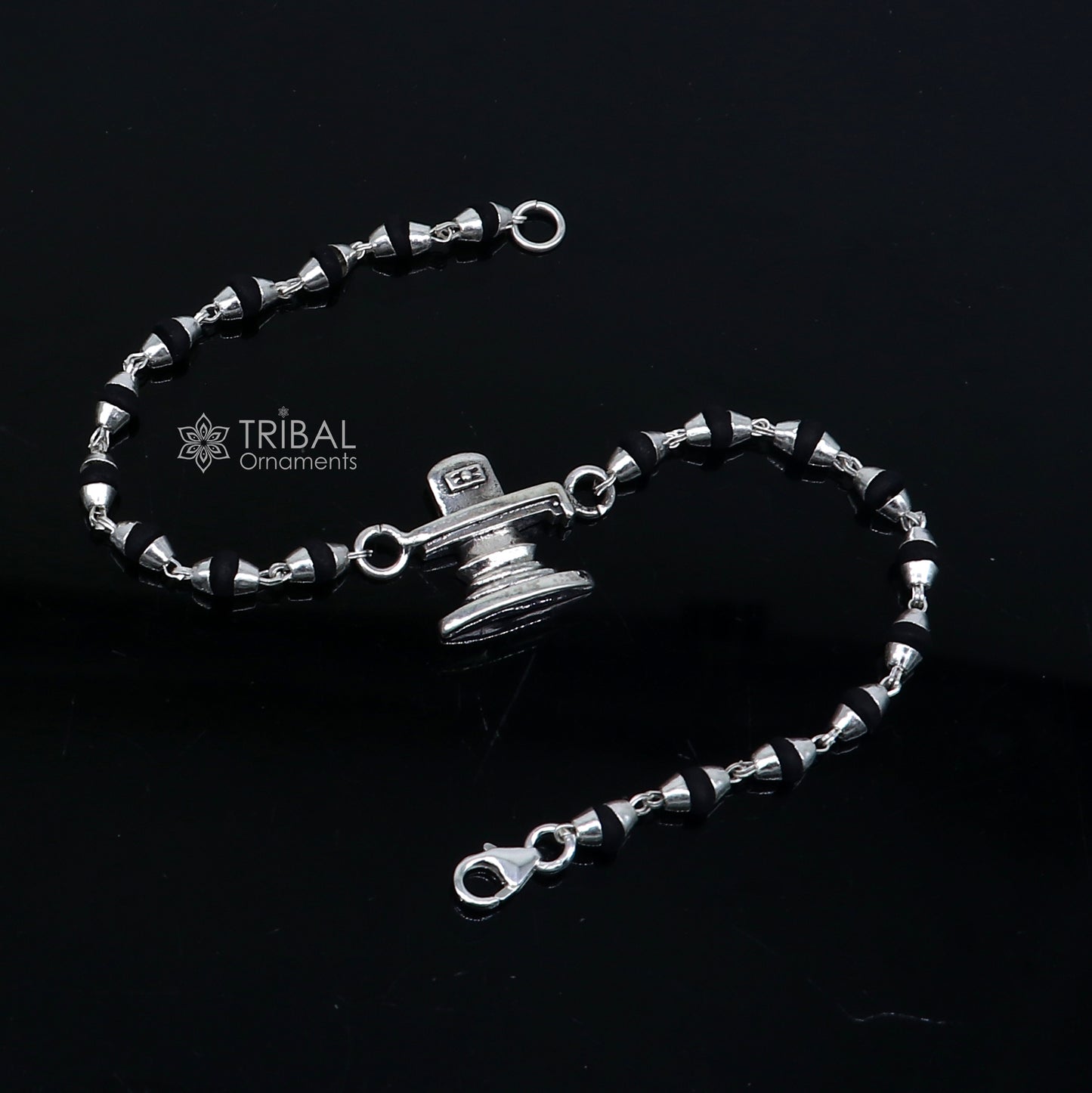 925 silver Lord Shiva Lingam bracelet with black Tulsi beads, handmade by Tribal Ornaments, featuring holy basil rosary beads.