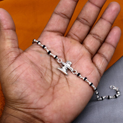 Sterling silver Lord Shiva Lingam bracelet with black Tulsi beads, handmade tribal ornament jewelry, traditional spiritual accessory.