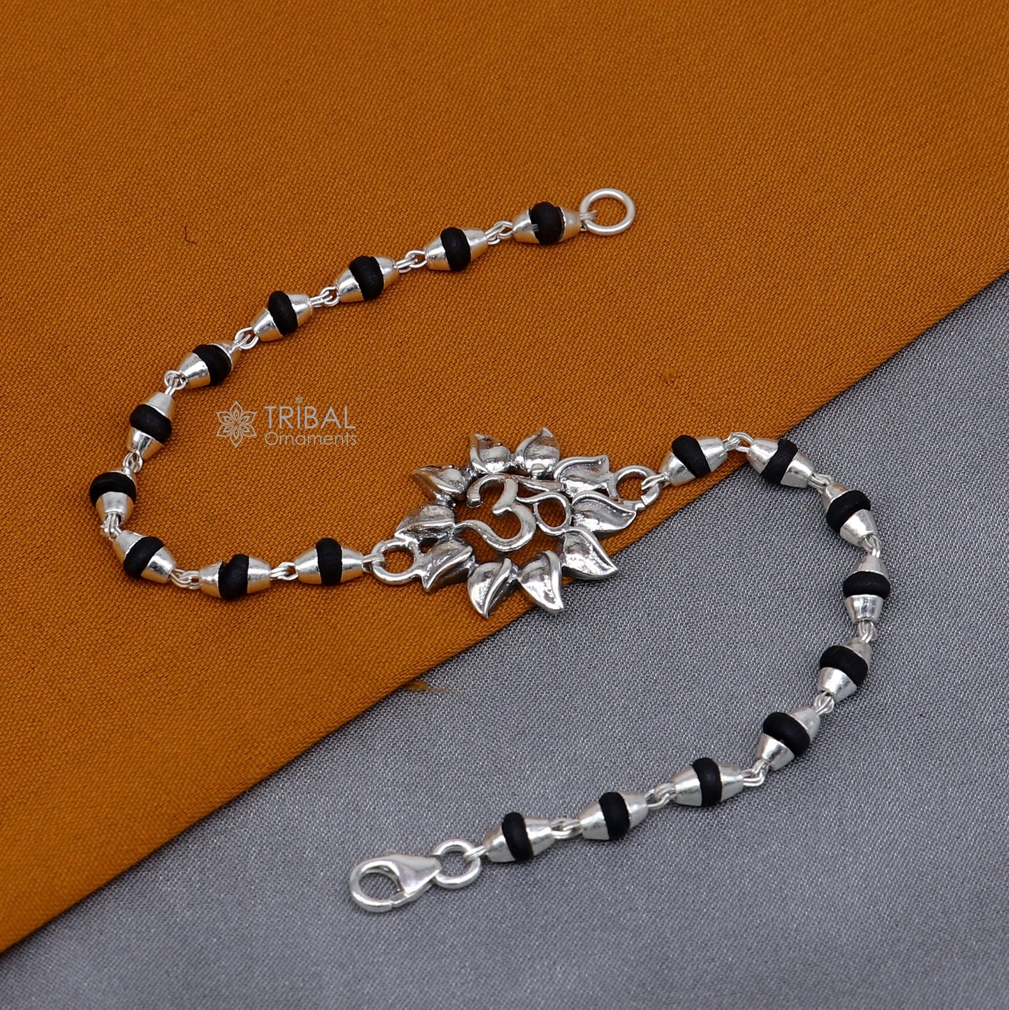 925 sterling silver Om design Shiva mantra bracelet with black Tulsi beads, handmade tribal ornament jewelry with holy basil accents.