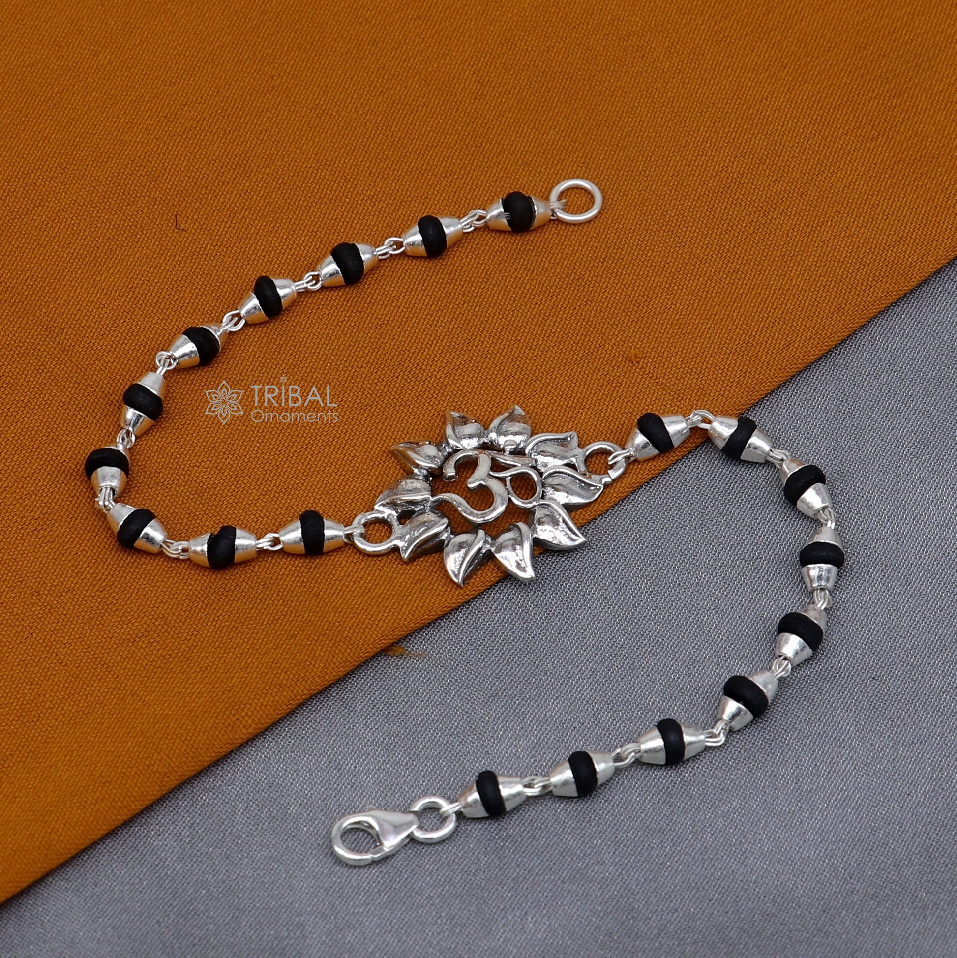 925 sterling silver Om design Shiva mantra bracelet with black Tulsi beads, handmade tribal ornament jewelry with holy basil accents.