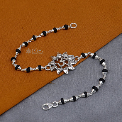 925 sterling silver Om design Shiva mantra bracelet with black Tulsi beads, handmade tribal ornament jewelry with holy basil accents.
