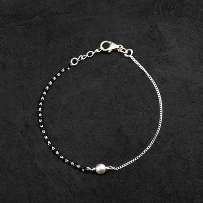 925 sterling silver pearl and black beaded chain bracelet and anklet combo by Tribal Ornaments, featuring traditional design elements.