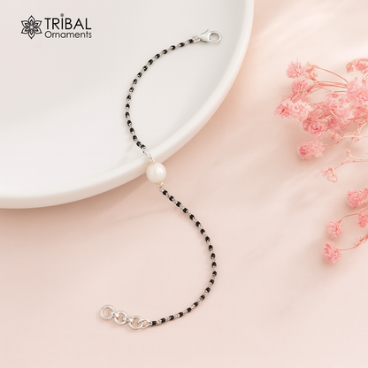 925 sterling silver bracelet with black beads and pearl accents, versatile jewelry for wrists or ankles, designed by TRIBAL ORNAMENTS