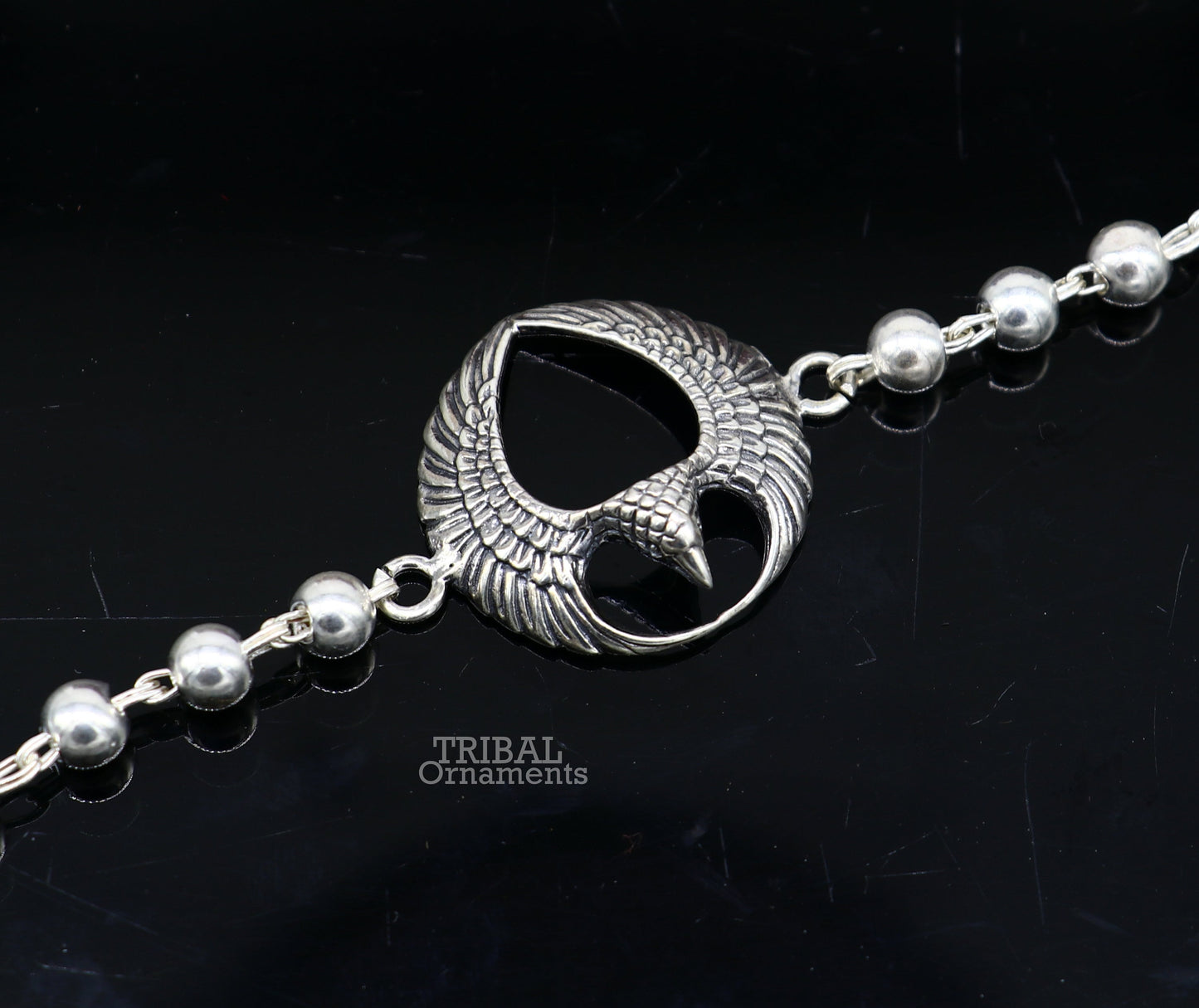 925 sterling silver Lord Garuda design Tulsi beaded bracelet Rakhi with basil rosary beads, handcrafted by Tribal Ornaments.
