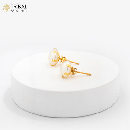 Exclusive round pearl stud earring in 14kt yellow gold by TRIBAL ORNAMENTS, suitable for unisex Indian jewelry.