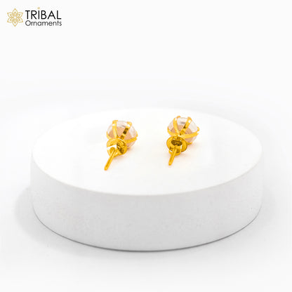Round pearl stud earring in 14kt yellow gold, unisex Indian jewelry by TRIBAL ORNAMENTS, featuring a classic, elegant design.