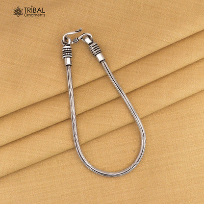 Sterling silver snake chain bracelet, flexible unisex jewelry with a stylish vintage design, 6 inches long, 4mm wide.