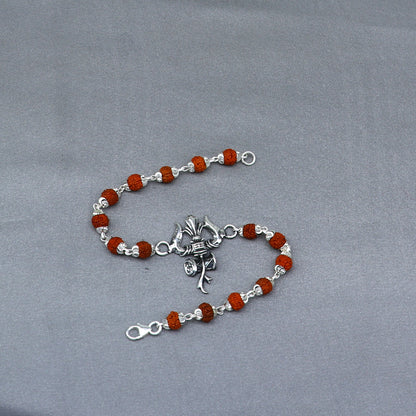 Sterling silver Rudraksha beaded Lord Shiva trident bracelet by Tribal Ornaments, featuring intricate Trishul design and beaded details.