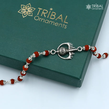 925 sterling silver Hanuman weapon and gota bracelet rakhi by TRIBAL ORNAMENTS featuring intricate design and traditional motifs.