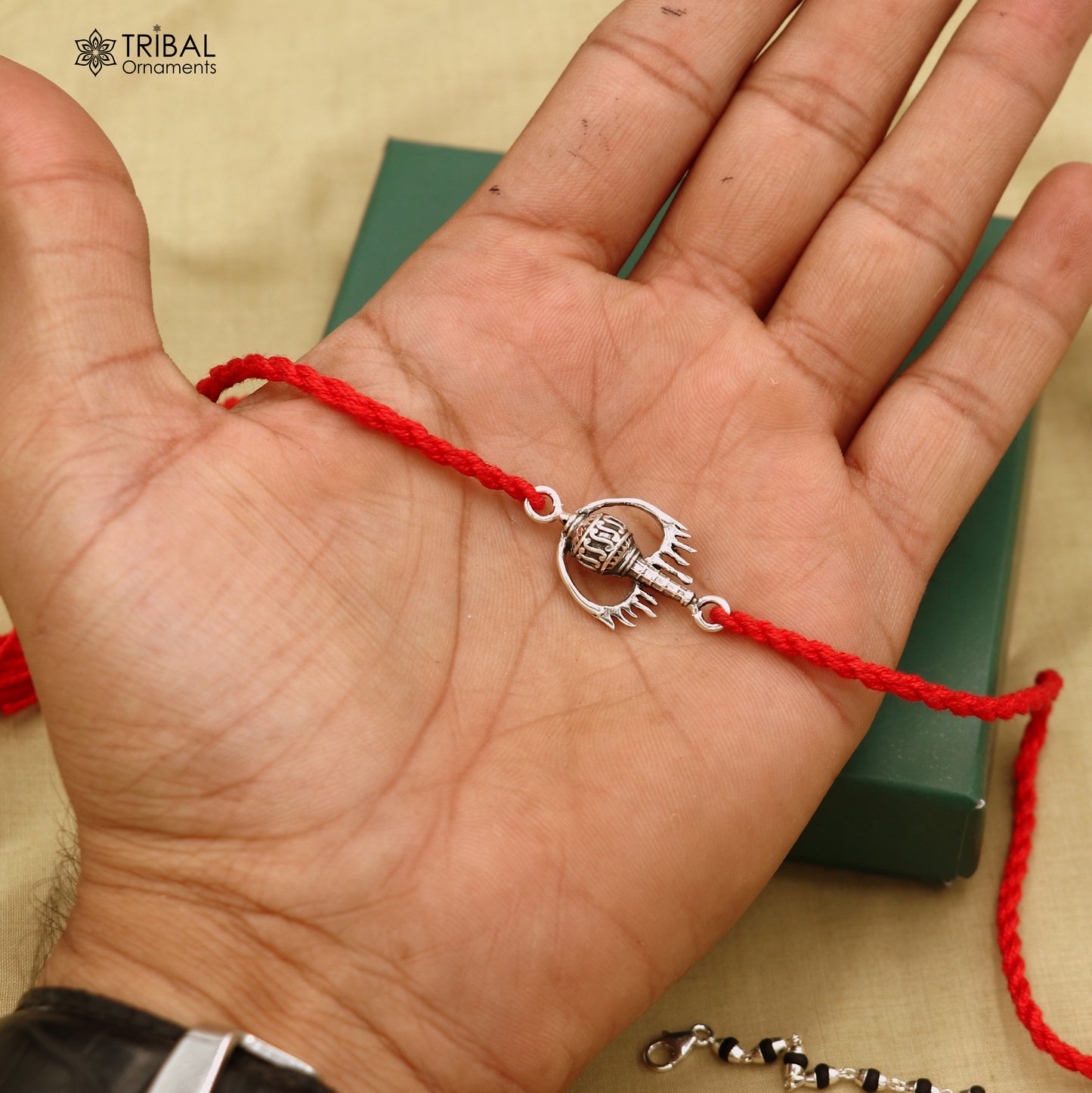 925 sterling silver Hanuman weapon and gota bracelet rakhi with intricate tribal design, handcrafted by TRIBAL ORNAMENTS.